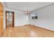 Dining room features hardwood floors, neutral wall paint, and a pendant light fixture at 375 Kohl St, Broomfield, CO 80020