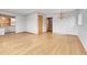 Spacious living room with gleaming hardwood floors and neutral gray paint at 375 Kohl St, Broomfield, CO 80020