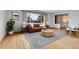 Bright living room features hardwood floors, large windows, and neutral paint at 375 Kohl St, Broomfield, CO 80020