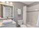 Clean bathroom featuring white fixtures, a neutral color palette, and a shower with bathtub combo at 4133 Niblick Dr, Longmont, CO 80503