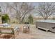An inviting outdoor living space with comfortable seating and a hot tub for relaxation at 4133 Niblick Dr, Longmont, CO 80503