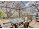 Outdoor dining area with a glass top table and views of the surrounding green space at 4133 Niblick Dr, Longmont, CO 80503
