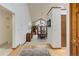 Dining room with vaulted ceilings, an elegant chandelier, and large windows at 4133 Niblick Dr, Longmont, CO 80503