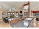 Open kitchen with granite countertops, vaulted ceilings, and seamless flow to living area at 4133 Niblick Dr, Longmont, CO 80503