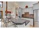 Kitchen with granite countertops, stainless steel appliances, and bar seating at 4133 Niblick Dr, Longmont, CO 80503