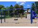Fun-filled playground area with swings and a slide, perfect for entertainment and activity at 4133 Niblick Dr, Longmont, CO 80503