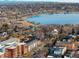 Expansive aerial view of the neighborhood, showing the lake, landscape, and surrounding community at 1581 Wolff St, Denver, CO 80204