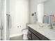 Bathroom with a combined toilet and shower/bath at 1581 Wolff St, Denver, CO 80204