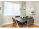 Chic dining area with modern lighting and a large window at 1581 Wolff St, Denver, CO 80204