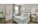 Cozy bedroom features a serene color palette and bright natural light at 4837 Cattle Cross Ln, Castle Rock, CO 80104