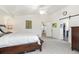 Bright main bedroom features ensuite bath, walk-in closet, and neutral decor throughout at 1540 Meachum Way, Erie, CO 80516