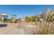 Community playground features swings, slides, and climbing structures, surrounded by green space and landscaping at 1540 Meachum Way, Erie, CO 80516