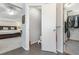 View from Primary bedroom through the bathroom and walk-in closet at 1540 Meachum Way, Erie, CO 80516