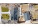 Aerial view of the home, garage, driveway, backyard, and surrounding neighborhood at 2990 S Elm St, Denver, CO 80222