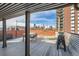 Rooftop deck with city views featuring ample space for outdoor enjoyment at 1130 N Pennsylvania St # 206, Denver, CO 80203