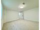 Basement bedroom with carpet, ample natural light, and white walls at 1559 S Forest St, Denver, CO 80222