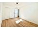 Bedroom with hardwood floors, closet with sliding doors at 1559 S Forest St, Denver, CO 80222
