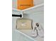Custom closet shelving and luxury retailer packaging at 1559 S Forest St, Denver, CO 80222