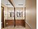 Bathroom view with double vanity and mirror with view into bedroom at 2800 Kalmia Ave # A310, Boulder, CO 80301