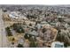 Community aerial view featuring mature trees, a tranquil pond, and access to nearby amenities at 2800 Kalmia Ave # A310, Boulder, CO 80301