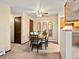 Bright dining area with a neutral color scheme and a view into the adjacent kitchen area at 2800 Kalmia Ave # A310, Boulder, CO 80301
