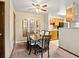 Charming dining area featuring a classic table, neutral chairs, and decorative mirrors for added style at 2800 Kalmia Ave # A310, Boulder, CO 80301