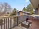 Comfortable patio seating with furniture, railing and view of the complex at 2800 Kalmia Ave # A310, Boulder, CO 80301