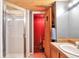 Modern bathroom features a walk-in shower, sauna, vanity with sink, and well-lit mirror at 1143 Auraria Pkwy # 101, Denver, CO 80204