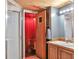 Bathroom features a sink, shower, and a sauna with wooden interiors, creating a spa-like experience at 1143 Auraria Pkwy # 101, Denver, CO 80204