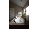 Spa-like bathroom with soaking tub, tiled surround, and natural light from window at 1214 S Fillmore St, Denver, CO 80210