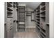 Spacious walk-in closet with custom shelving and drawers, providing ample storage space at 1214 S Fillmore St, Denver, CO 80210