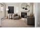 Cozy living room boasts a fireplace, stylish seating, and a decorative mirror at 1214 S Fillmore St, Denver, CO 80210