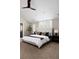 Spacious main bedroom with carpet, ceiling fan and lots of natural light at 1214 S Fillmore St, Denver, CO 80210