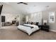 Large main bedroom, adjacent seating area with fireplace, and large windows at 1214 S Fillmore St, Denver, CO 80210