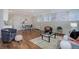 Cozy living room with ample natural light and wood flooring throughout at 909 N Logan St # 1B, Denver, CO 80203