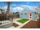 Spacious backyard with artificial turf and access, perfect for outdoor activities at 161 W Maple Ave, Denver, CO 80223