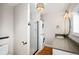 Bathroom with shower, toilet and vanity at 161 W Maple Ave, Denver, CO 80223