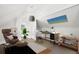 Cozy bonus room with ample natural light, perfect for a home office or creative studio at 161 W Maple Ave, Denver, CO 80223