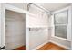 Well-organized closet with shelving and natural light, providing ample storage space with easy access to belongings at 161 W Maple Ave, Denver, CO 80223