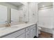 Clean bathroom with double vanity and bathtub at 3494 N Irvington St, Aurora, CO 80019