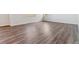 Large living area featuring hardwood-style flooring at 3494 N Irvington St, Aurora, CO 80019