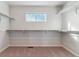 Spacious walk-in closet features ample shelving and hanging space at 3494 N Irvington St, Aurora, CO 80019
