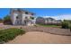 A large backyard features a two-story home with a deck, a patio, and a well-maintained lawn at 1325 Kingsfield St, Castle Rock, CO 80104