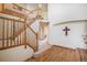 Elegant foyer with a soaring staircase, hardwood floors, and neutral decor at 1325 Kingsfield St, Castle Rock, CO 80104