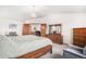 Large main bedroom features a dresser, closet, and sitting area for relaxing at 1325 Kingsfield St, Castle Rock, CO 80104