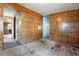 Spacious bedroom featuring decorative paneled walls and wood flooring at 12 Marshall Pl, Longmont, CO 80504