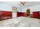 Spacious living room featuring wood flooring, paneled walls, and natural light at 12 Marshall Pl, Longmont, CO 80504