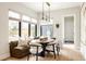Cozy breakfast nook with a built-in bench, natural light, and modern design at 1130 S Cook St, Denver, CO 80210