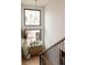 Elegant entryway featuring a stylish chandelier and a decorative cabinet at 1130 S Cook St, Denver, CO 80210