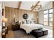 Vaulted ceiling bedroom with wood paneling, modern lighting, and large windows at 1130 S Cook St, Denver, CO 80210